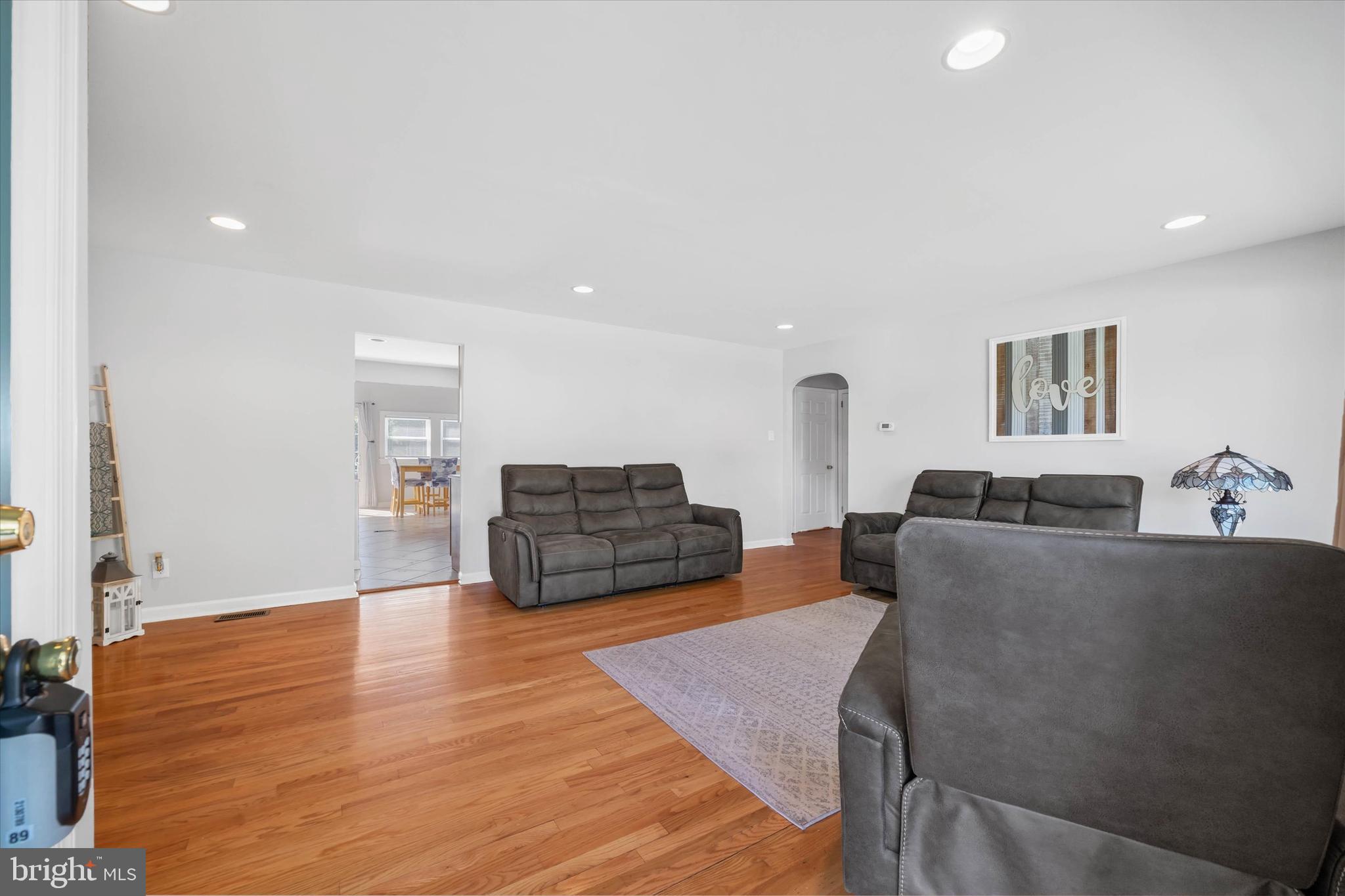 4 Flora Circle Newark, DE 19711 - Photo 10 of 41 a living room with furniture and wooden floor