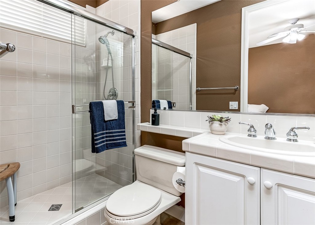 17 Oakmont Drive Rancho Mirage, CA 92270 - Photo 17 of 27 a bathroom with a sink a toilet and shower