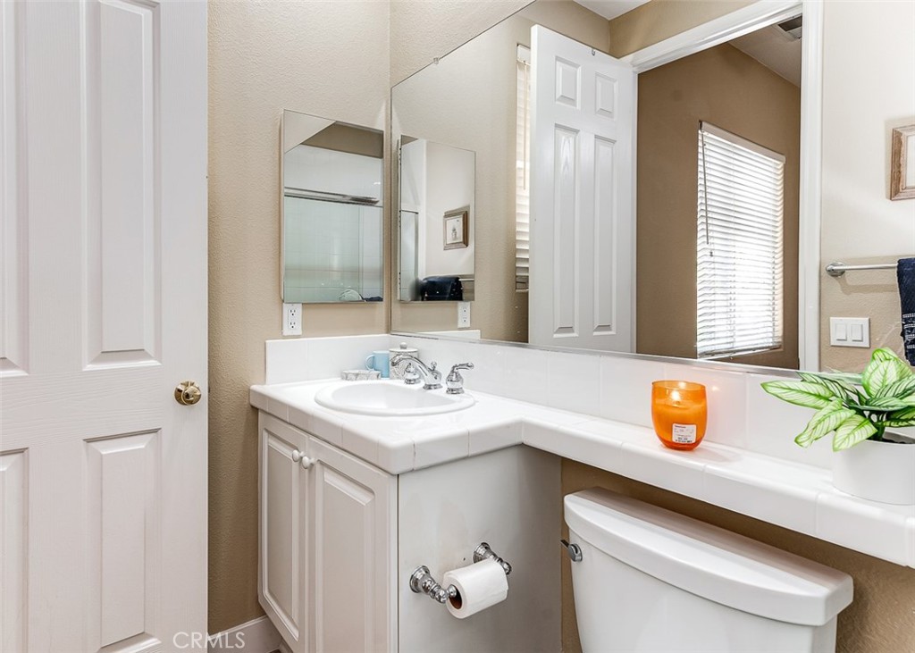 17 Oakmont Drive Rancho Mirage, CA 92270 - Photo 18 of 27 a bathroom with a sink and a mirror