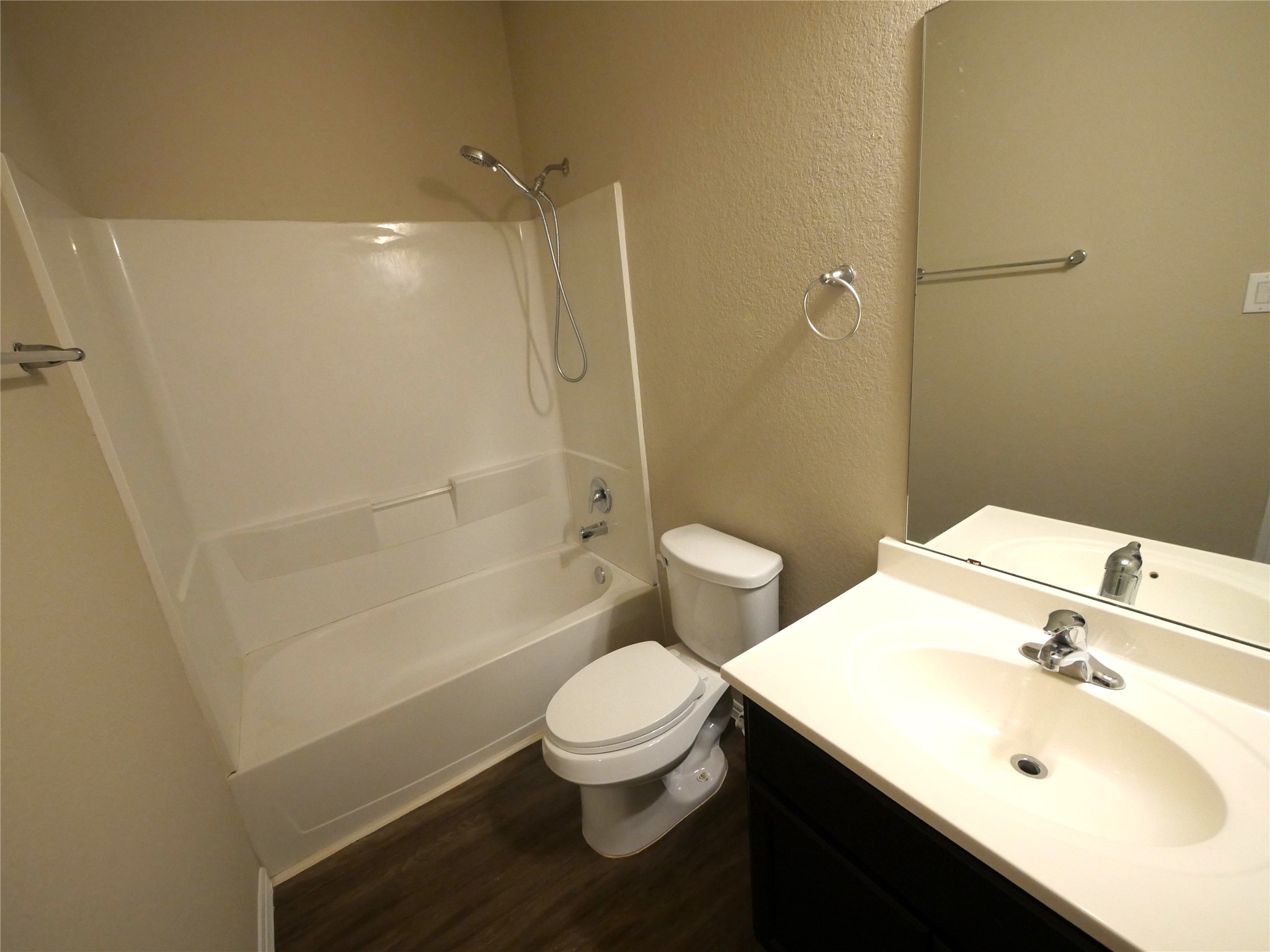 9843 Swindale Ridge Lane Houston, TX 77044 - Photo 13 of 17 Clean and functional secondary bathroom conveniently serving the additional bedrooms and living areas.