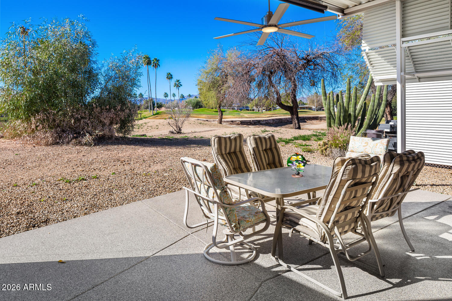 17200 West Bell Road, Unit 1054 Surprise, AZ 85374 - Photo 13 of 46 a view of a chairs and table in patio