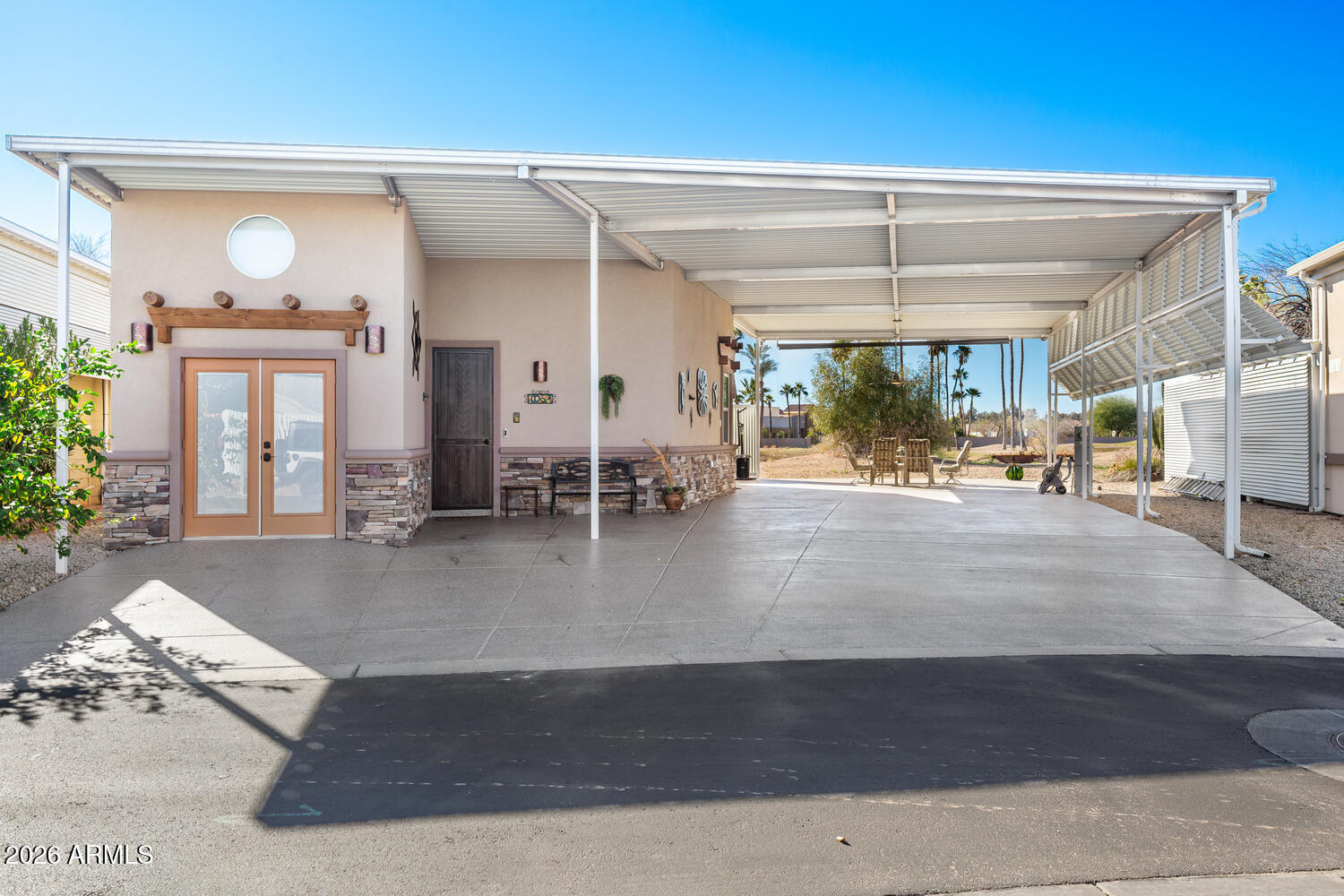 17200 West Bell Road, Unit 1054 Surprise, AZ 85374 - Photo 2 of 46 a view of a livingroom with furniture and a large window