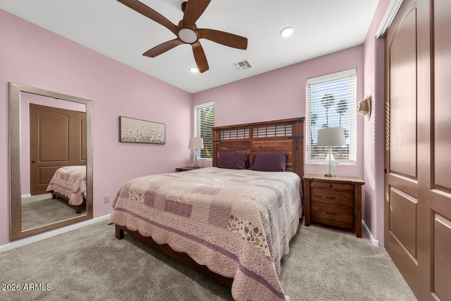 17200 West Bell Road, Unit 1054 Surprise, AZ 85374 - Photo 24 of 46 a bedroom with a bed and a walk in closet