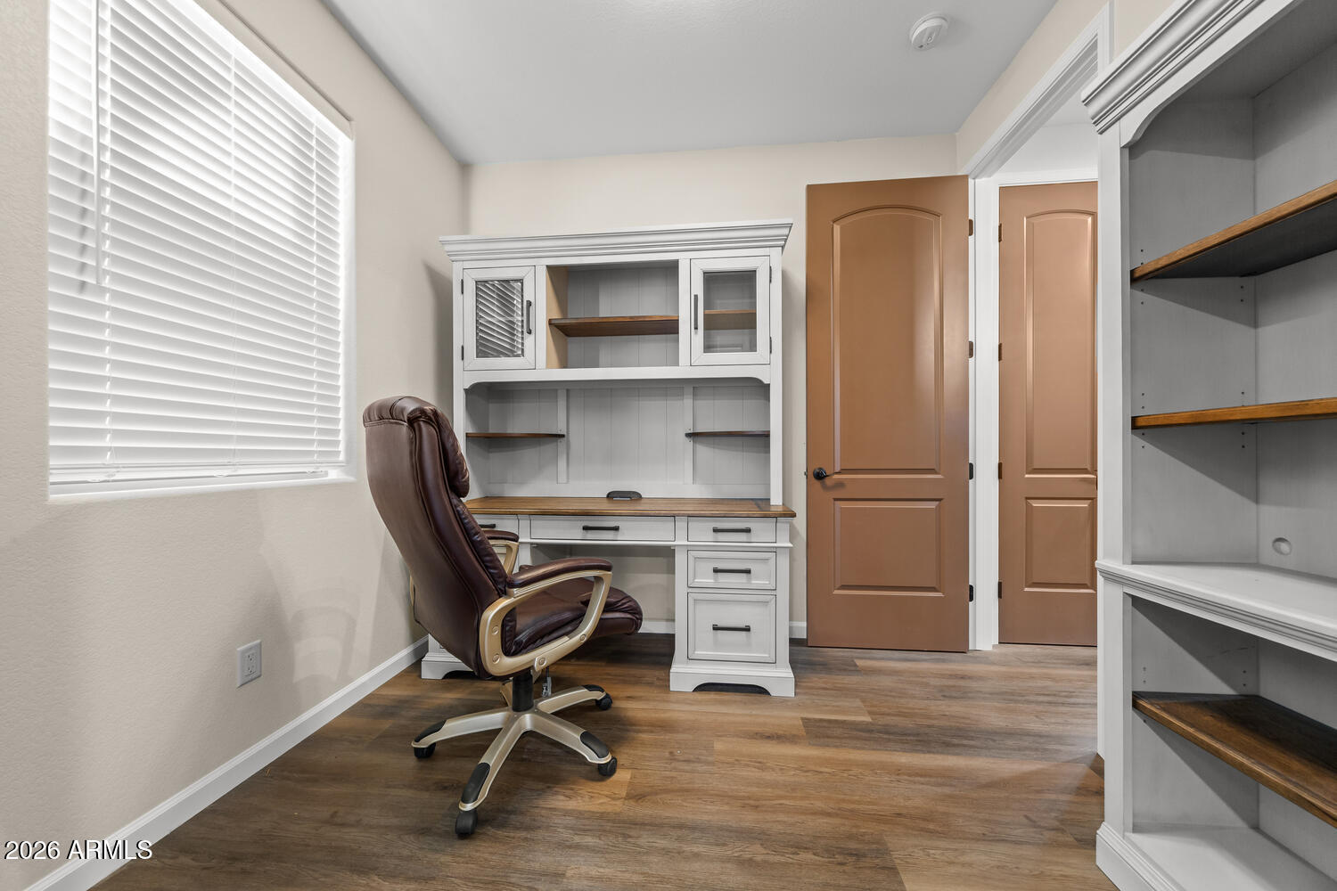 17200 West Bell Road, Unit 1054 Surprise, AZ 85374 - Photo 30 of 46 a view of a workspace with furniture and a window