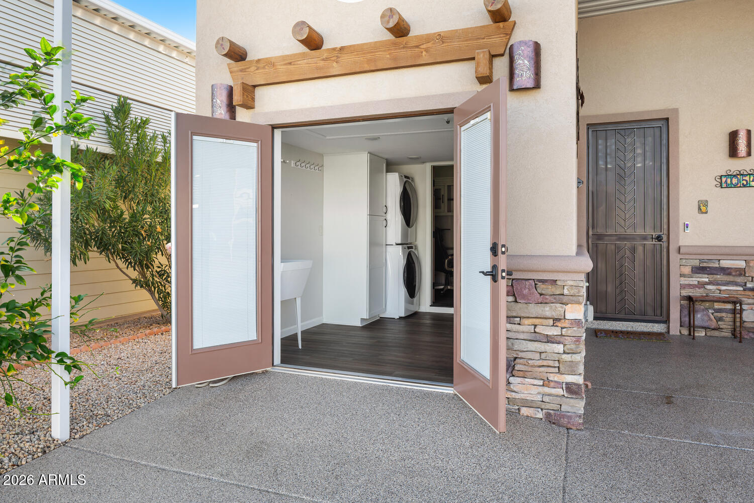 17200 West Bell Road, Unit 1054 Surprise, AZ 85374 - Photo 31 of 46 front view of a house with a porch