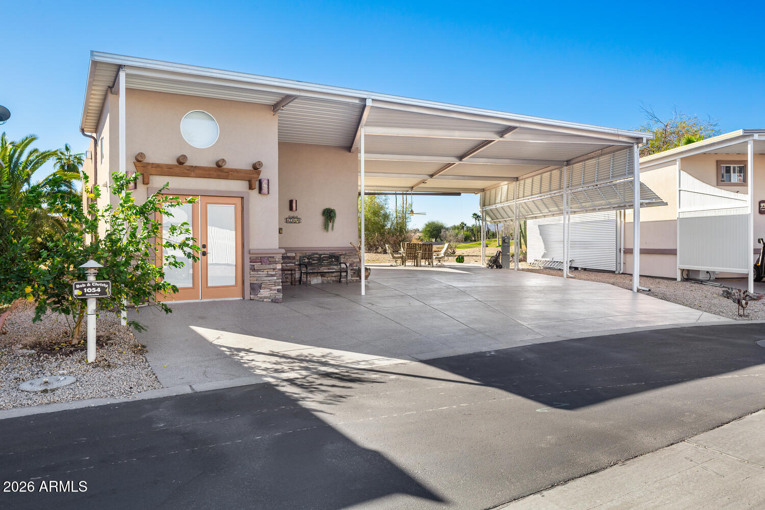 17200 West Bell Road, Unit 1054 Surprise, AZ 85374 - Photo 9 of 46 a view of a living room and a garage