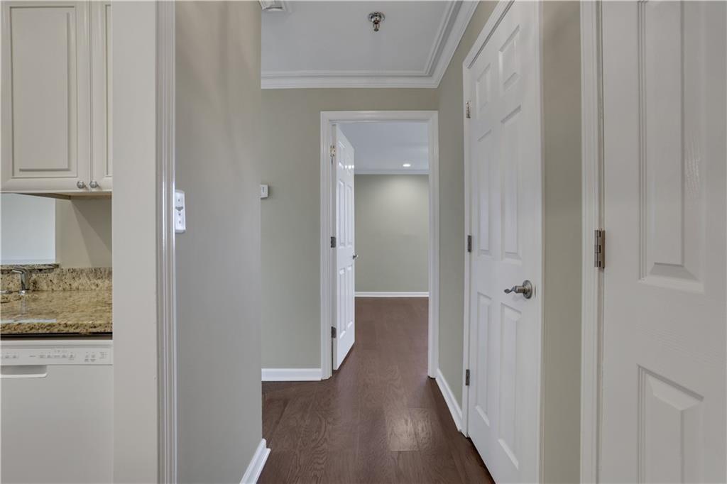 300 Johnson Ferry Road, Unit B902 Atlanta, GA 30328 - Photo 10 of 37 a view of a hallway with wooden floor