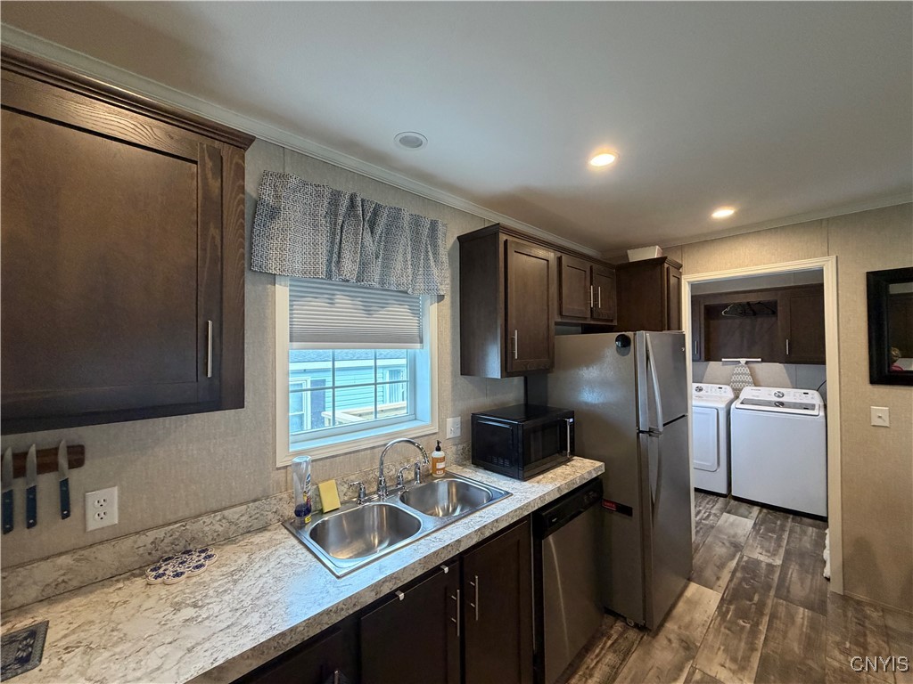 5600 # 69 Shute Road La Fayette, NY 13084 - Photo 12 of 40 Stainless steel appliances, laundry room close by