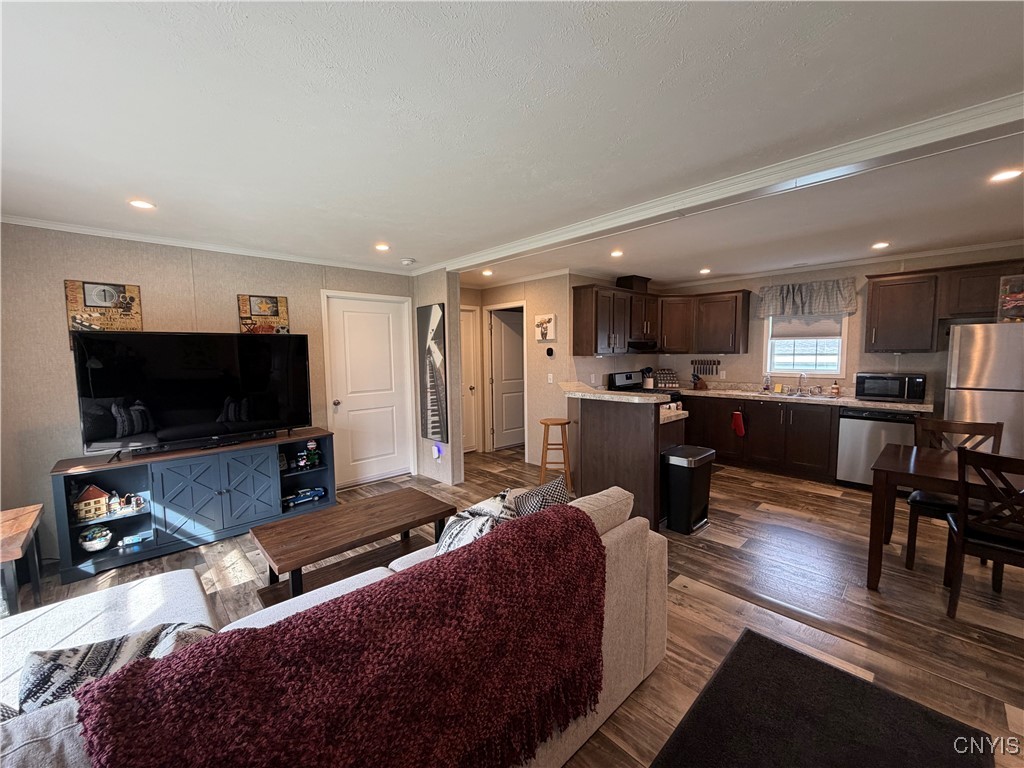 5600 # 69 Shute Road La Fayette, NY 13084 - Photo 16 of 40 neuetral wood tones throughout