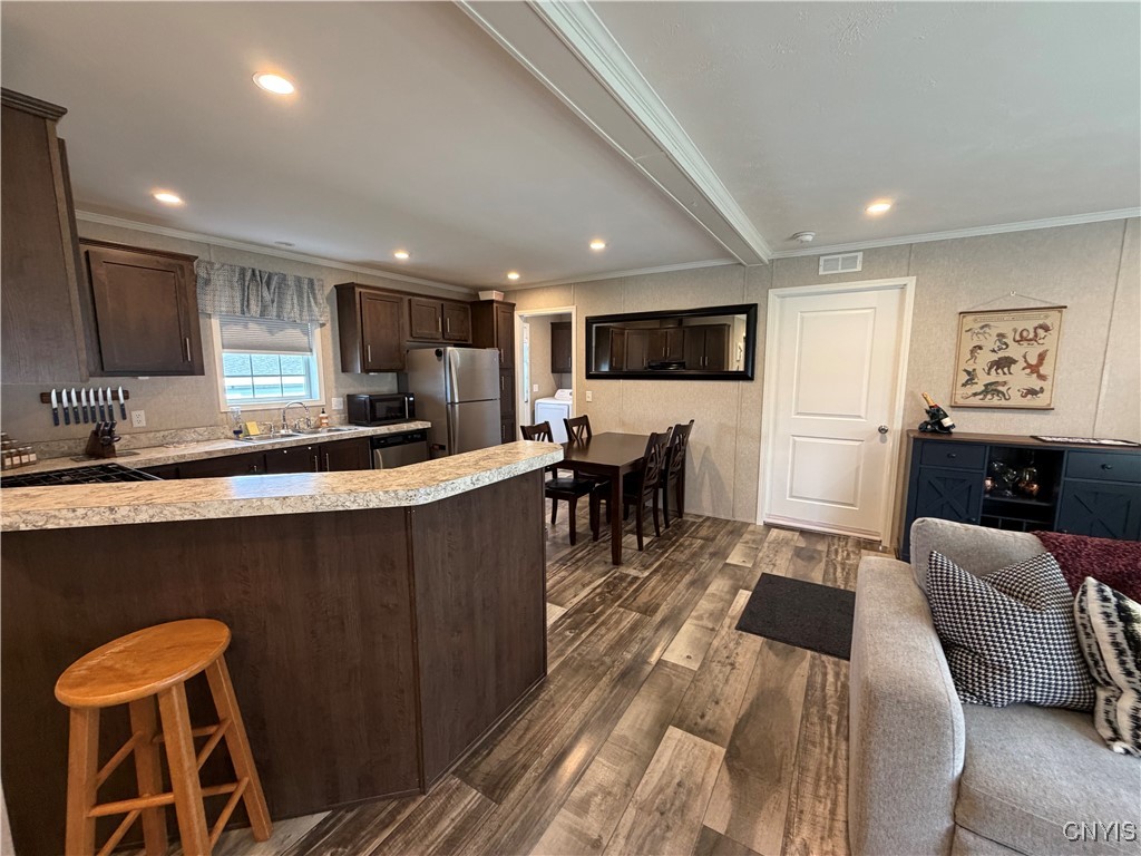 5600 # 69 Shute Road La Fayette, NY 13084 - Photo 9 of 40 Showing off the awesome dark cabinets, they're sup