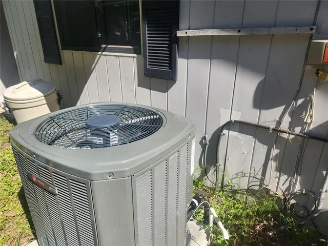 a kitchen with a sink and mirror