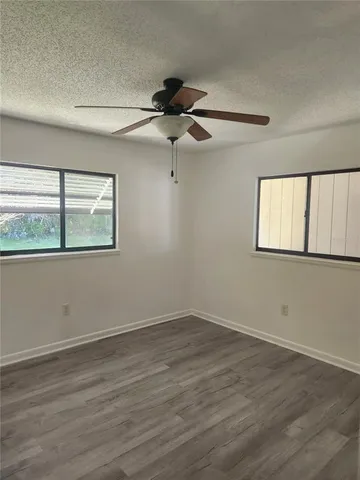 a view of a room that has a window in it