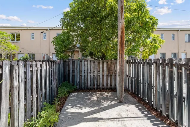 a view of a fence of the house