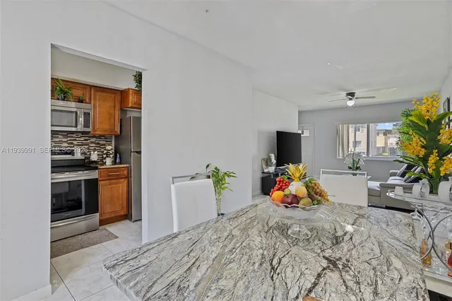 a bed room with a bed and a television