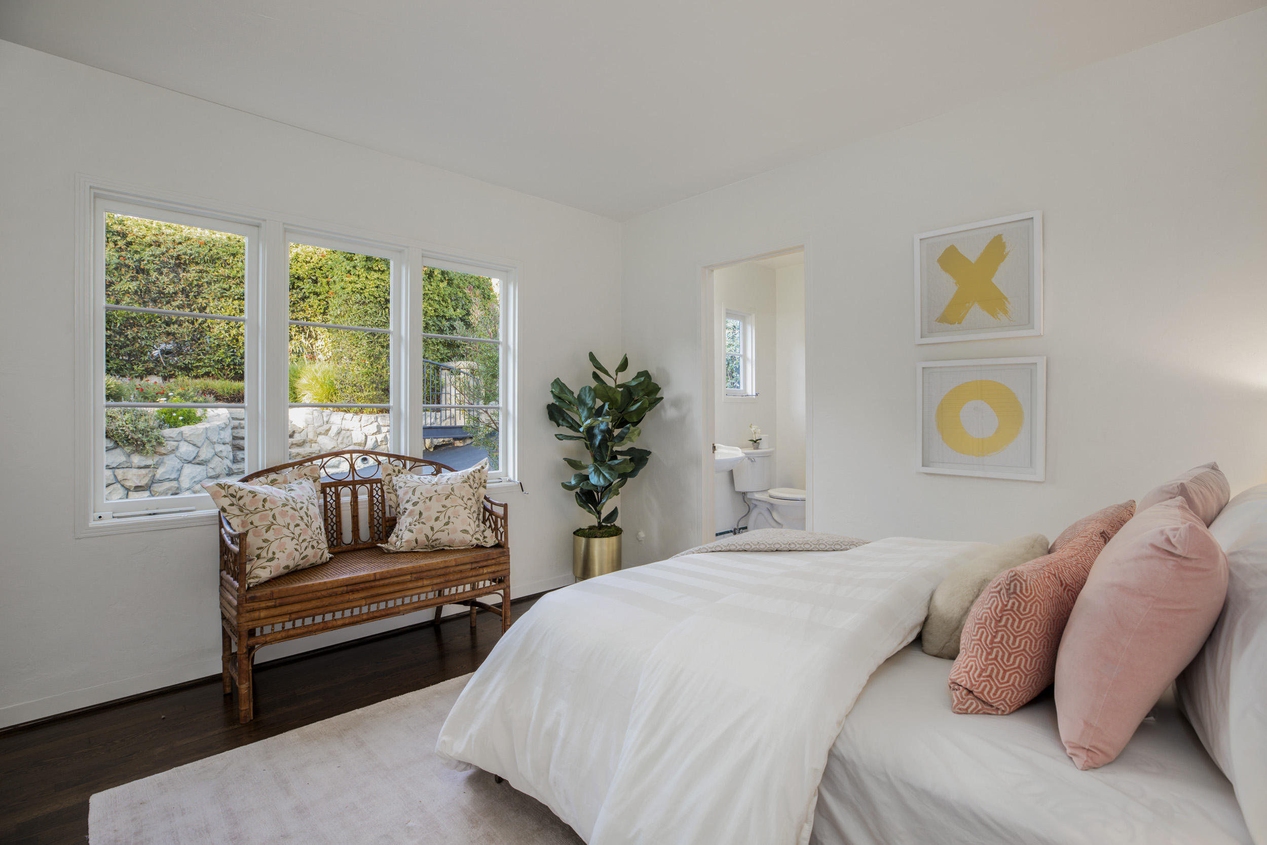 925 Jimeno Road Santa Barbara, CA 93103 - Photo 11 of 26 a bedroom with a bed and a couch