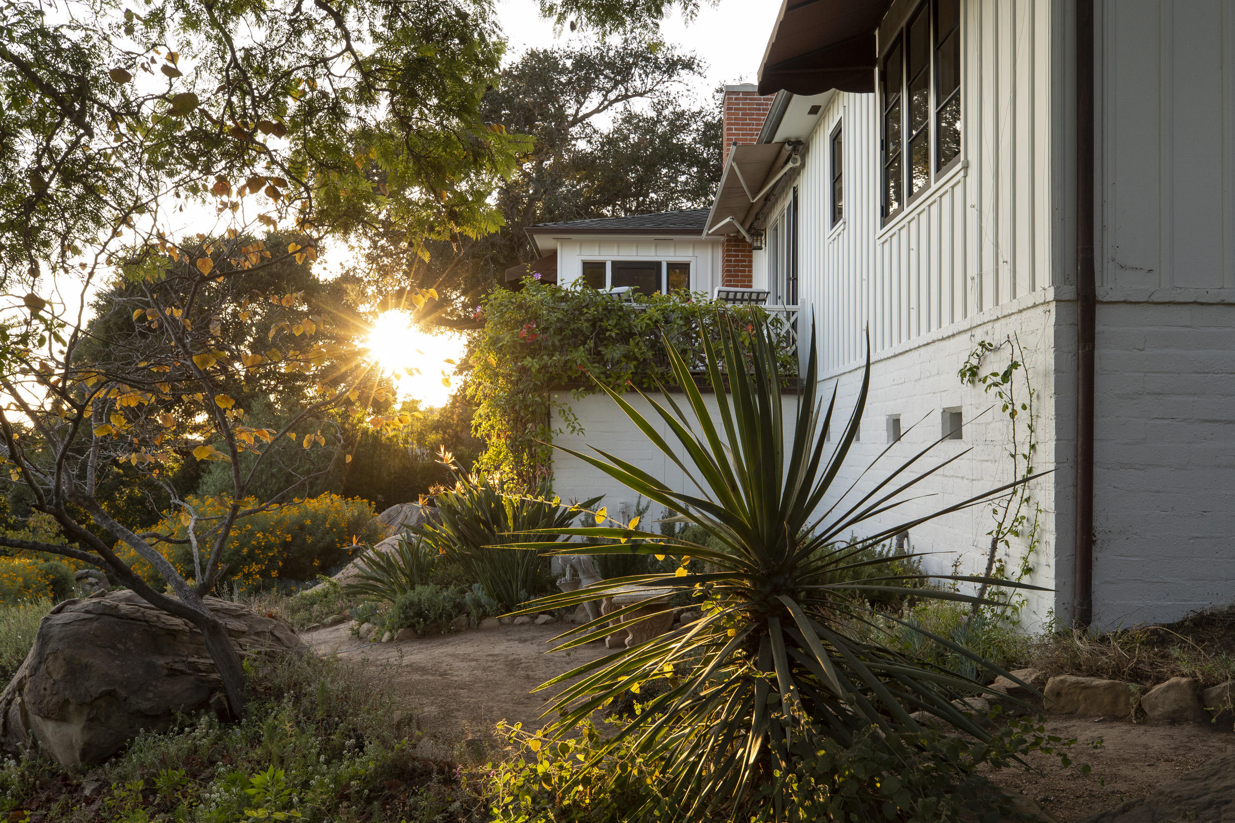 925 Jimeno Road Santa Barbara, CA 93103 - Photo 18 of 26 a view of a house with a yard