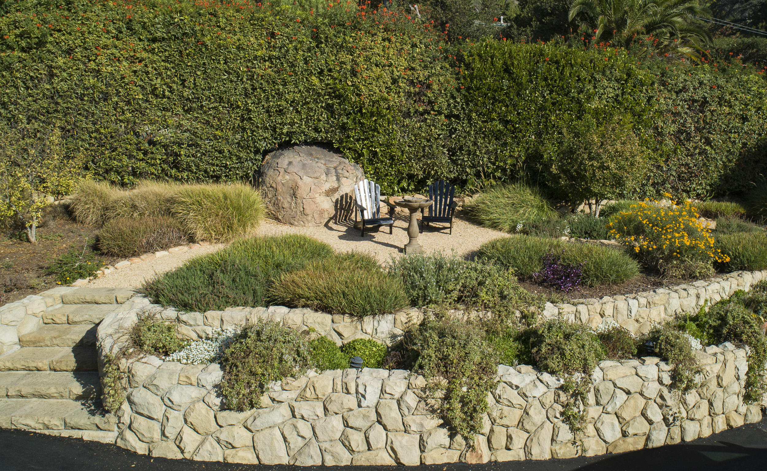 925 Jimeno Road Santa Barbara, CA 93103 - Photo 23 of 26 a backyard of a house with a yard and outdoor seating