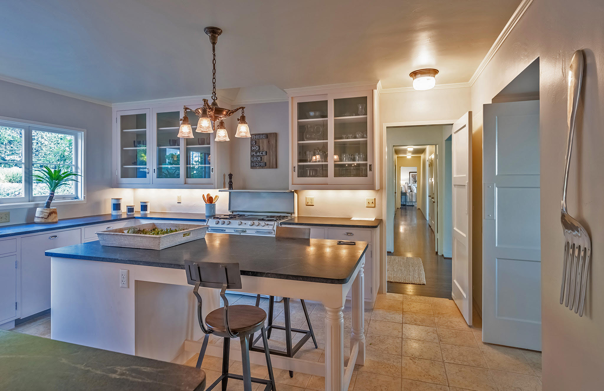 925 Jimeno Road Santa Barbara, CA 93103 - Photo 7 of 26 a kitchen with a table and chairs