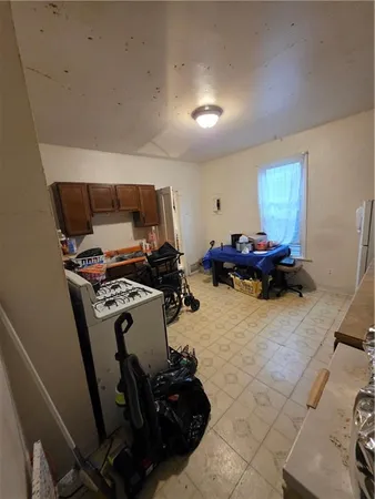 a room with furniture and gym equipment