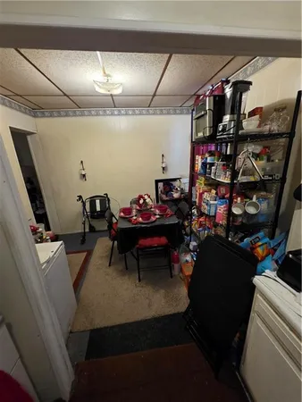 a view of a chairs and tables in a room