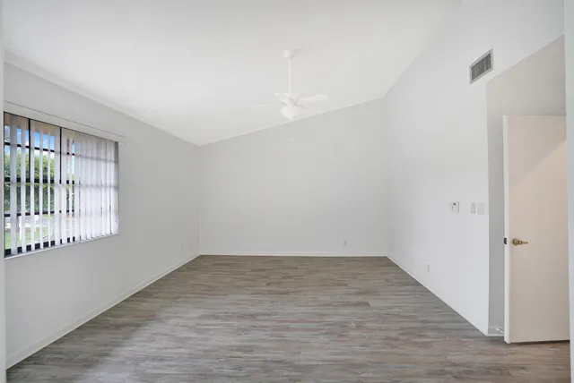 a view of a hallway with closet