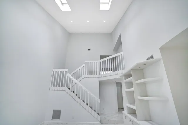 a view of staircase with white walls and white walls