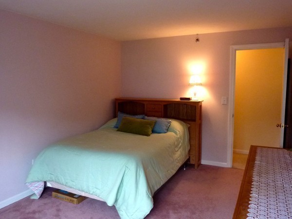 360 Littleton Road, Unit 18E Chelmsford, MA 01824 - Photo 8 of 13 a bedroom with a bed and a window