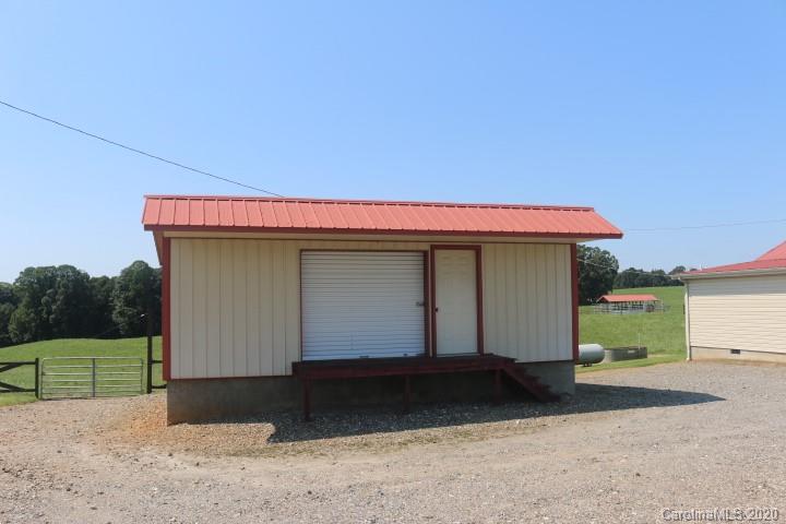 1949 Huckleberry Ridge Road Hiddenite, NC 28636 - Photo 4 of 31 a front view of a house