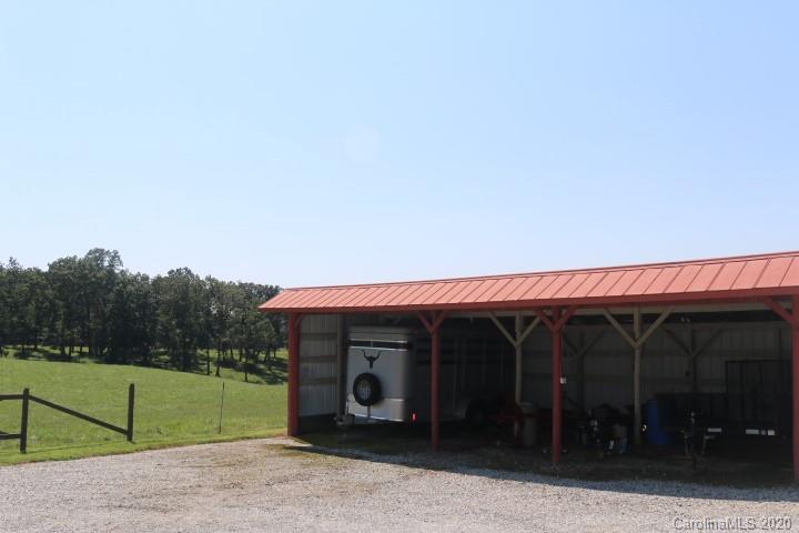 1949 Huckleberry Ridge Road Hiddenite, NC 28636 - Photo 6 of 31 a view of a porch