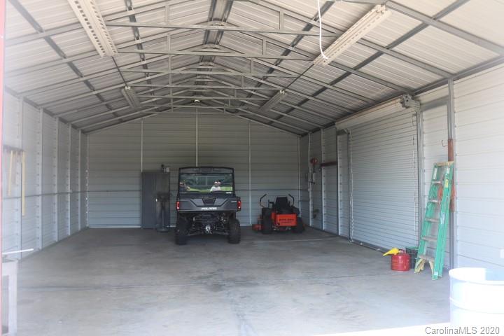 1949 Huckleberry Ridge Road Hiddenite, NC 28636 - Photo 8 of 31 a view of parking garage with cars