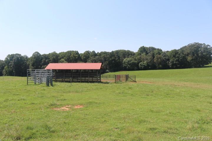 1949 Huckleberry Ridge Road Hiddenite, NC 28636 - Photo 9 of 31 a view of a swimming pool with a yard