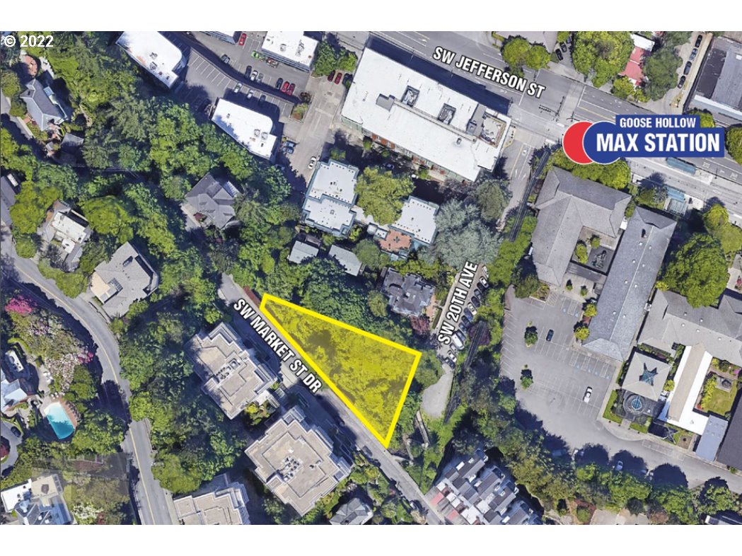 an aerial view of residential house with outdoor space and swimming pool