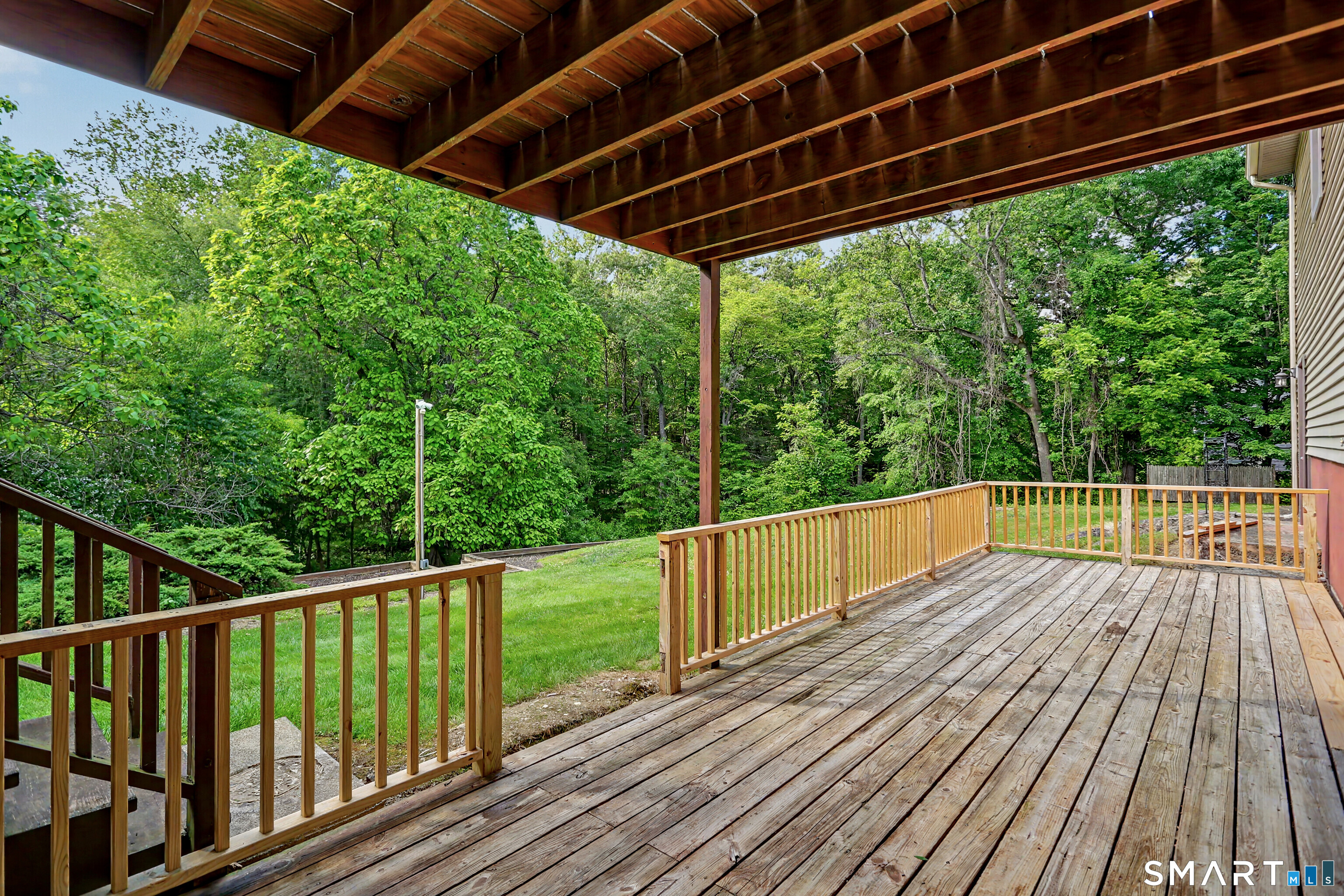 632 Wheelers Farm Road Orange, CT 06477 - Photo 31 of 39 a view of balcony with wooden floor