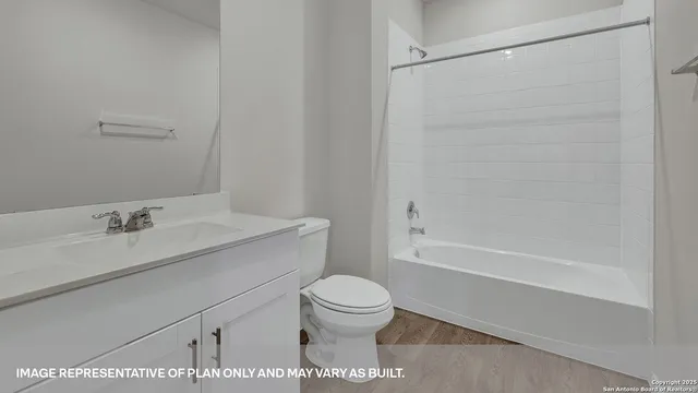 a bathroom with a sink a toilet and a bathtub