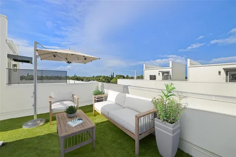 a view of a hallway with windows