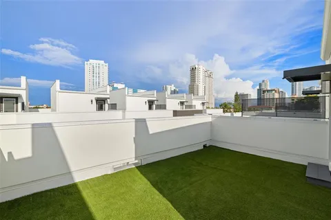 a view of a city with tall buildings