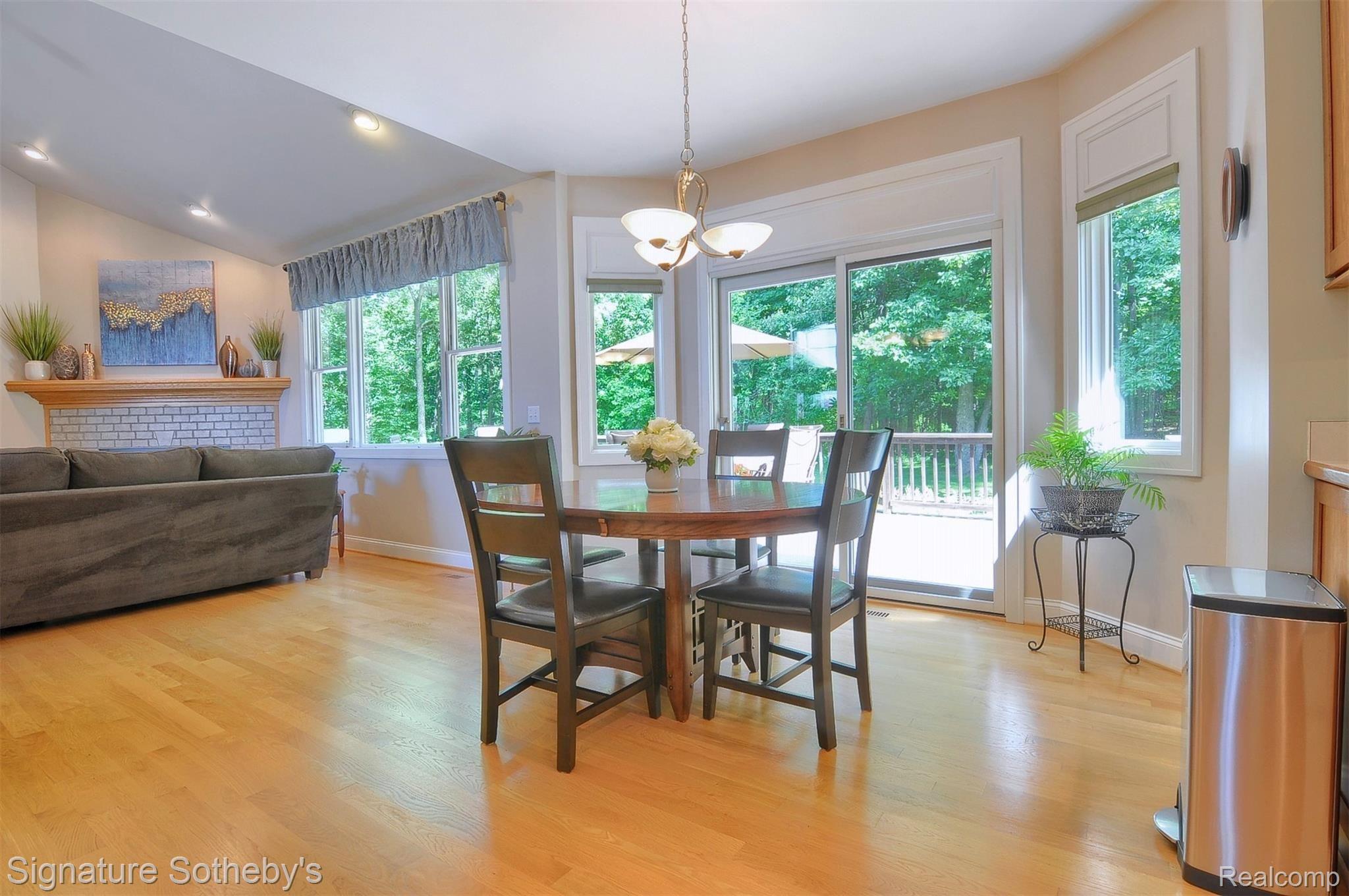 12293 Ivy Lane Fenton, MI 48430 - Photo 4 of 43 Breakfast Nook, Pella Door Wall to Large Deck and Hot Tub