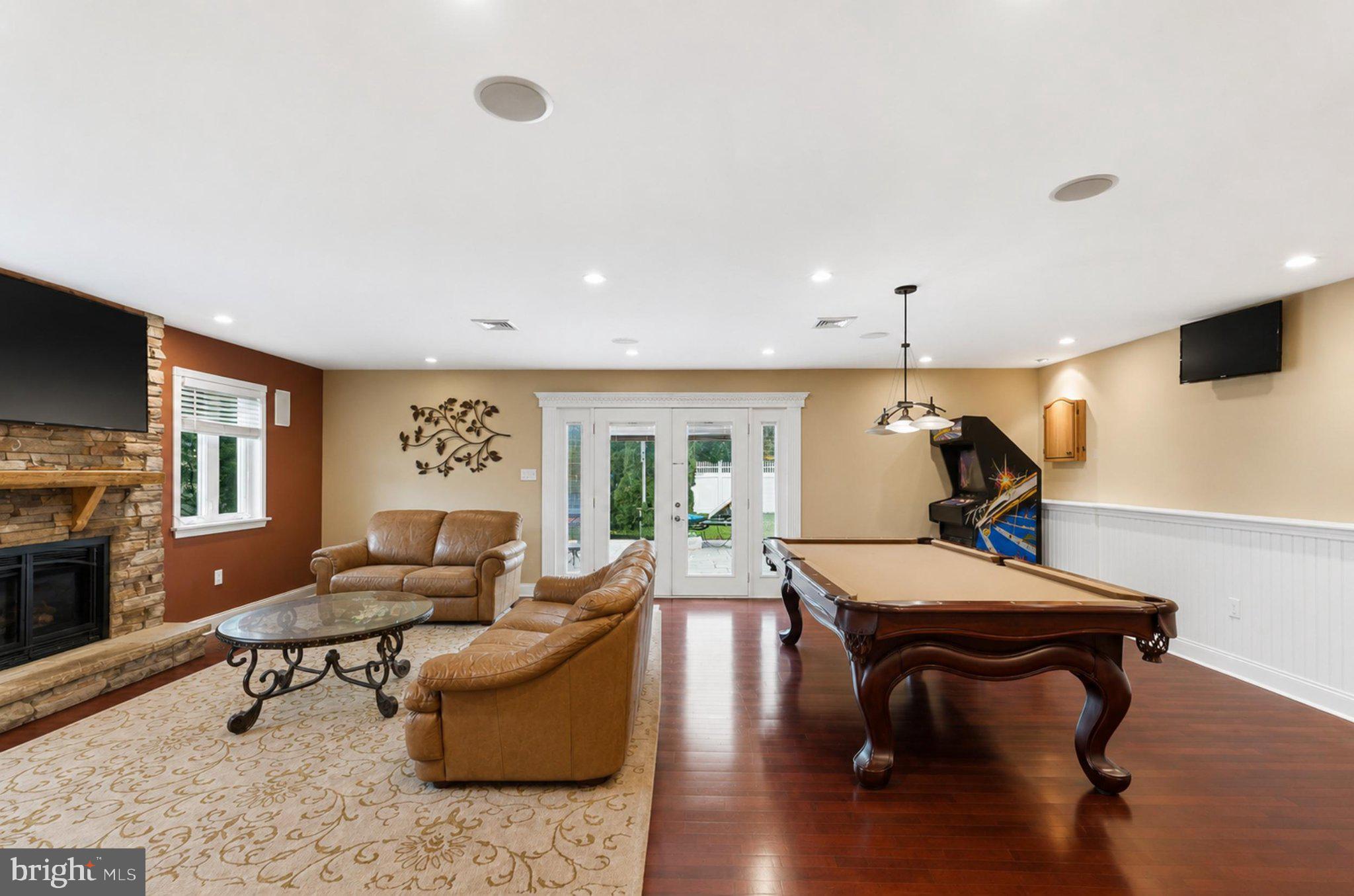 1002 Tannerie Run Road Ambler, PA 19002 - Photo 29 of 67 Spacious entertainment room with charm.