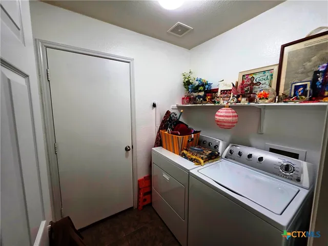 a room with storage and utility racks