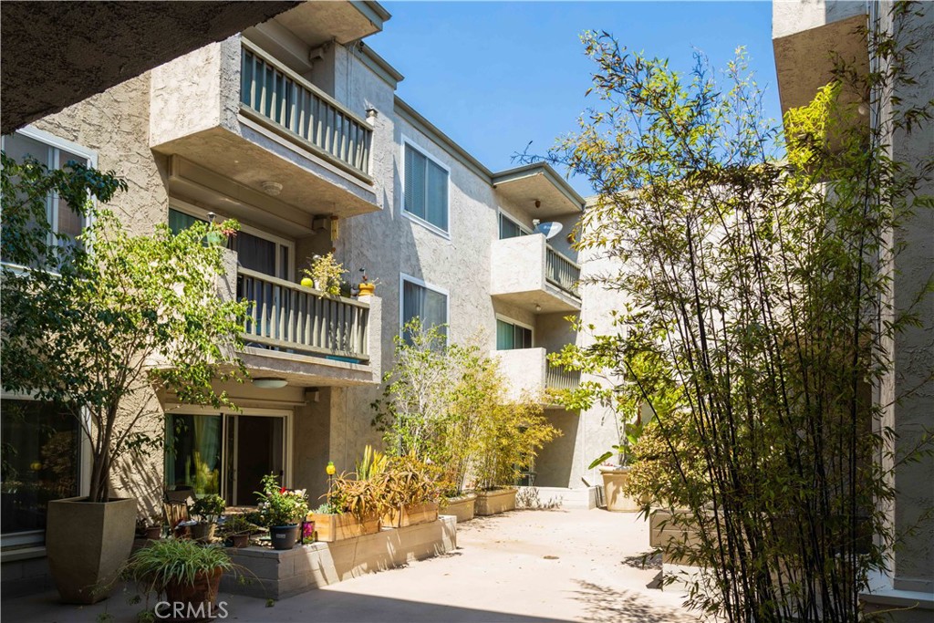 8740 Tuscany Avenue Playa del Rey, CA 90293 - Photo 16 of 21 a front view of a house with outdoor seating