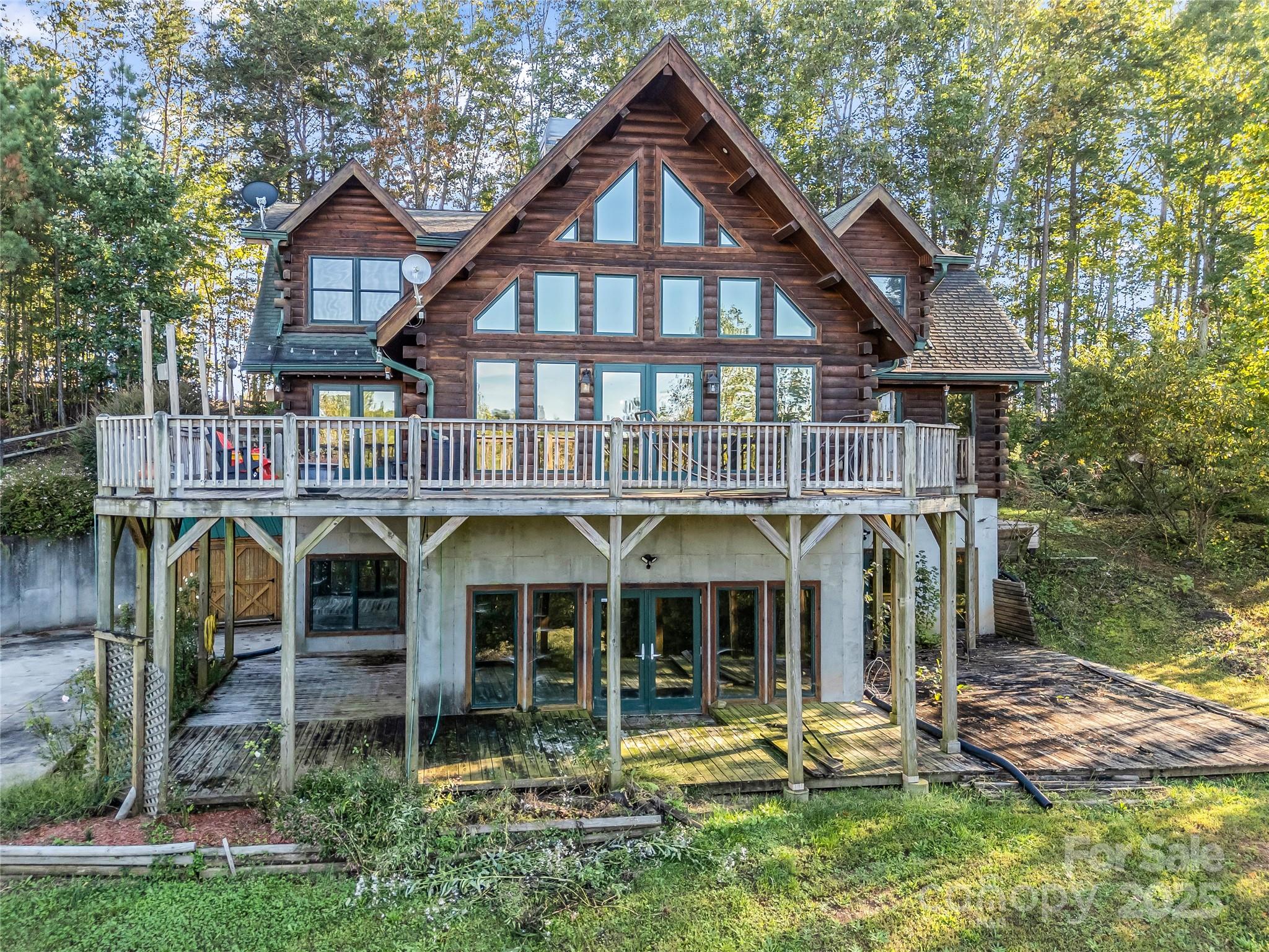 134 Moriah Drive Rutherfordton, NC 28139 - Photo 1 of 37 a front view of a house with a yard table and chairs