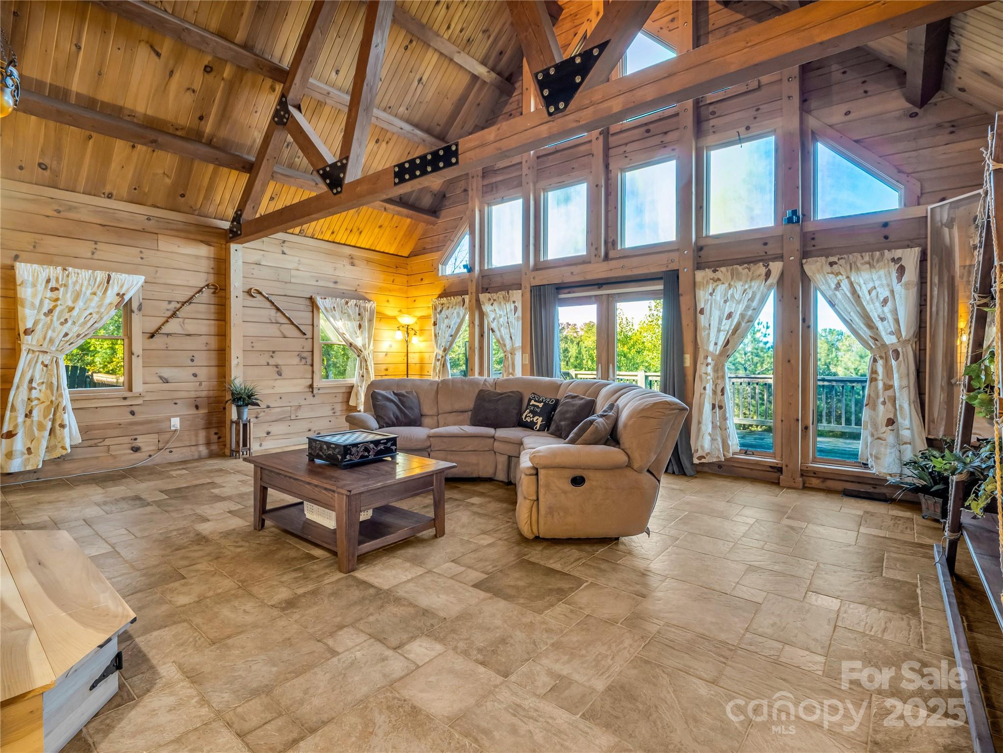 134 Moriah Drive Rutherfordton, NC 28139 - Photo 12 of 37 a lobby with furniture and floor to ceiling windows