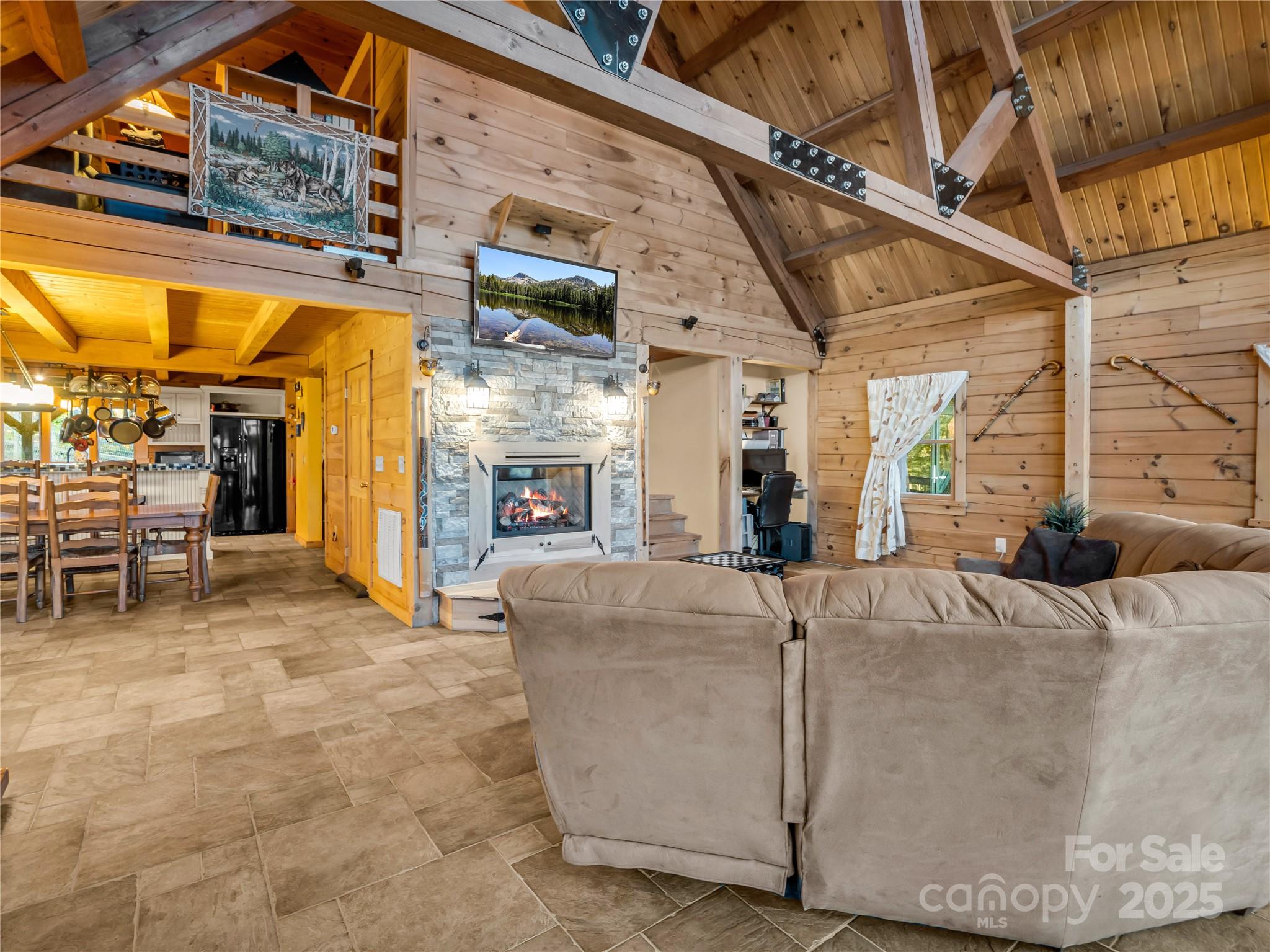 134 Moriah Drive Rutherfordton, NC 28139 - Photo 13 of 37 a living room with furniture and a fireplace