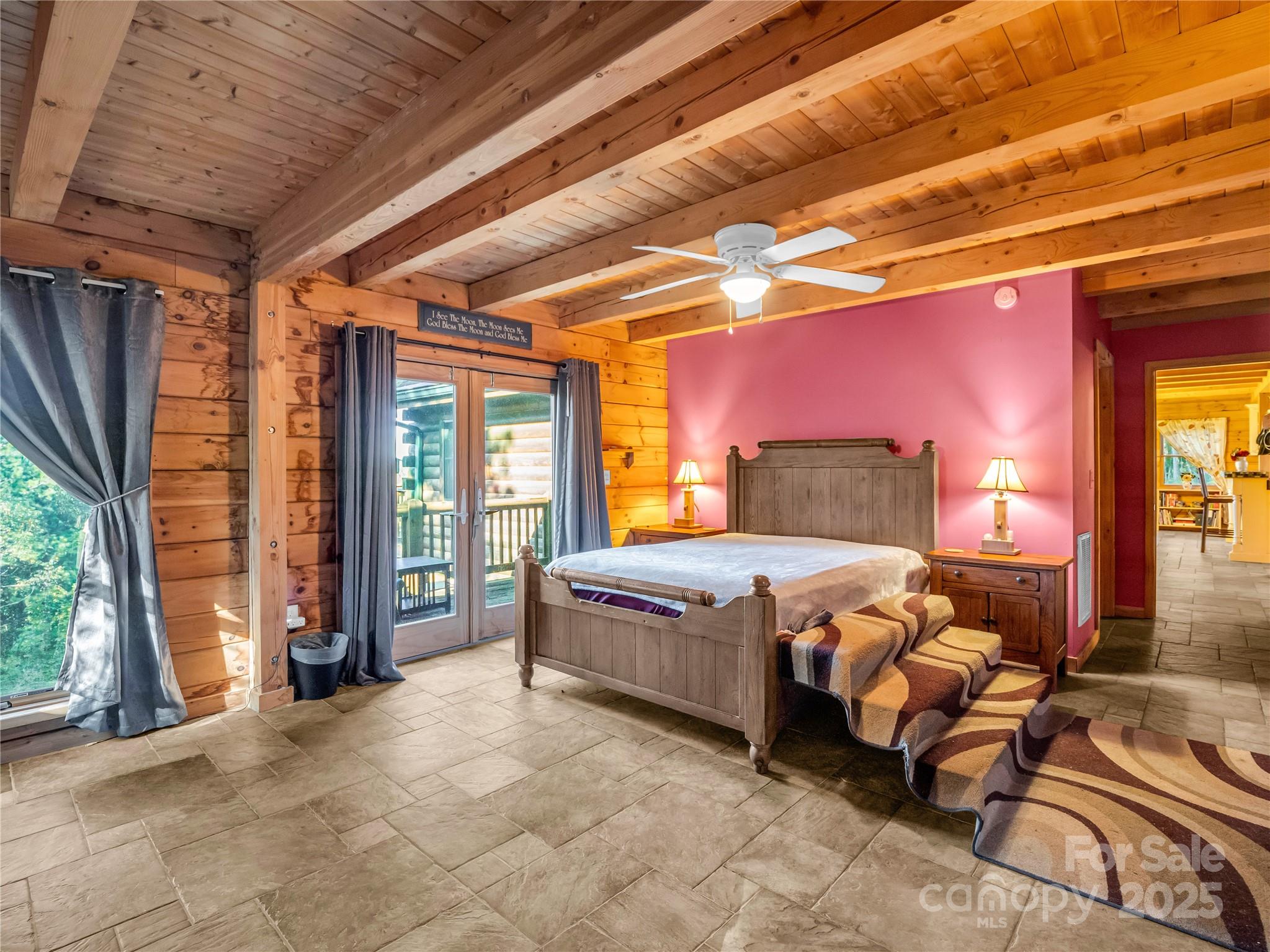 134 Moriah Drive Rutherfordton, NC 28139 - Photo 16 of 37 a bedroom with bed and large windows