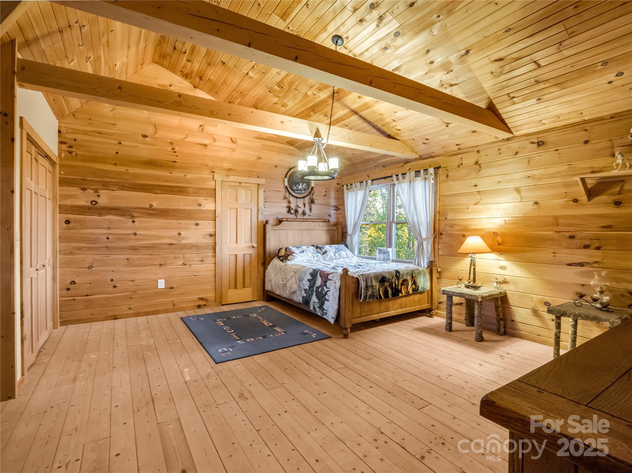 134 Moriah Drive Rutherfordton, NC 28139 - Photo 24 of 37 a bedroom with a bed and wooden floor