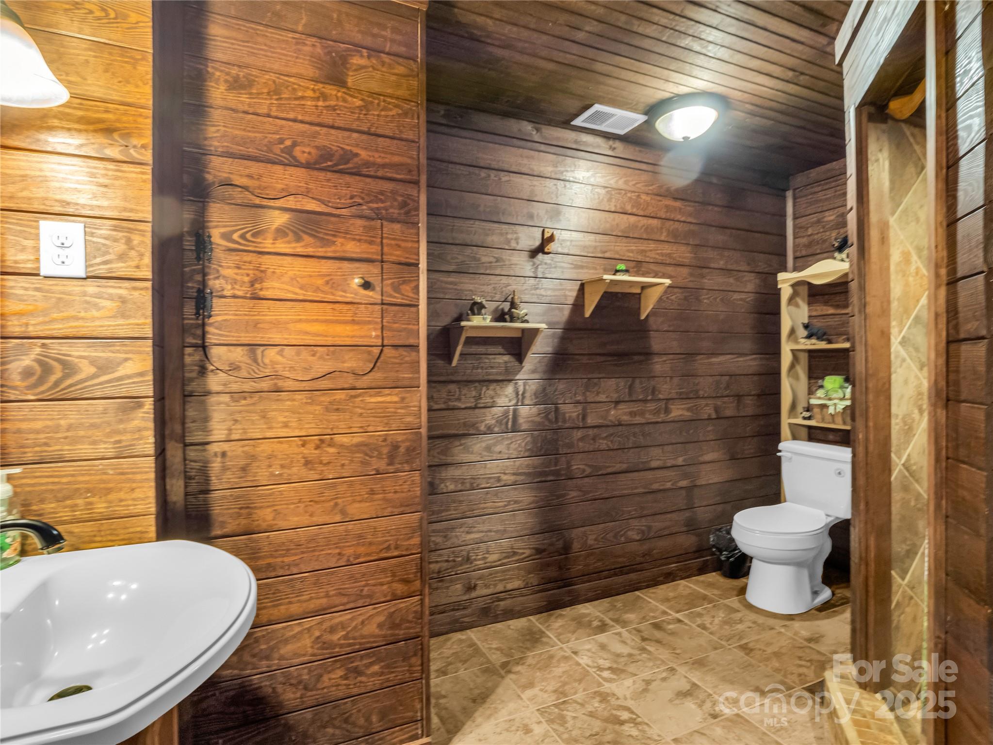 134 Moriah Drive Rutherfordton, NC 28139 - Photo 29 of 37 a bathroom with a toilet and a shower