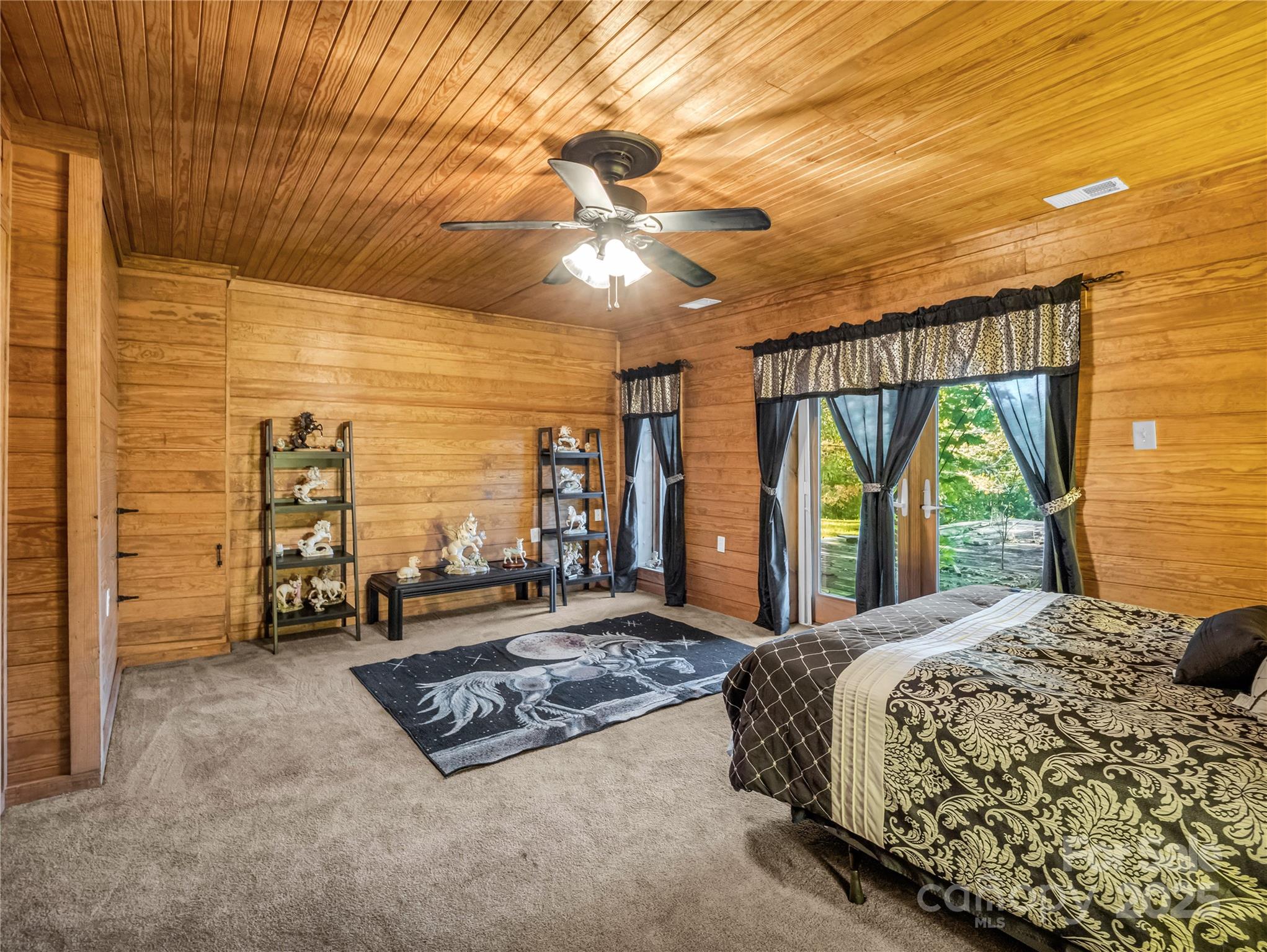 134 Moriah Drive Rutherfordton, NC 28139 - Photo 31 of 37 a bed sitting in a spacious bedroom next to a window