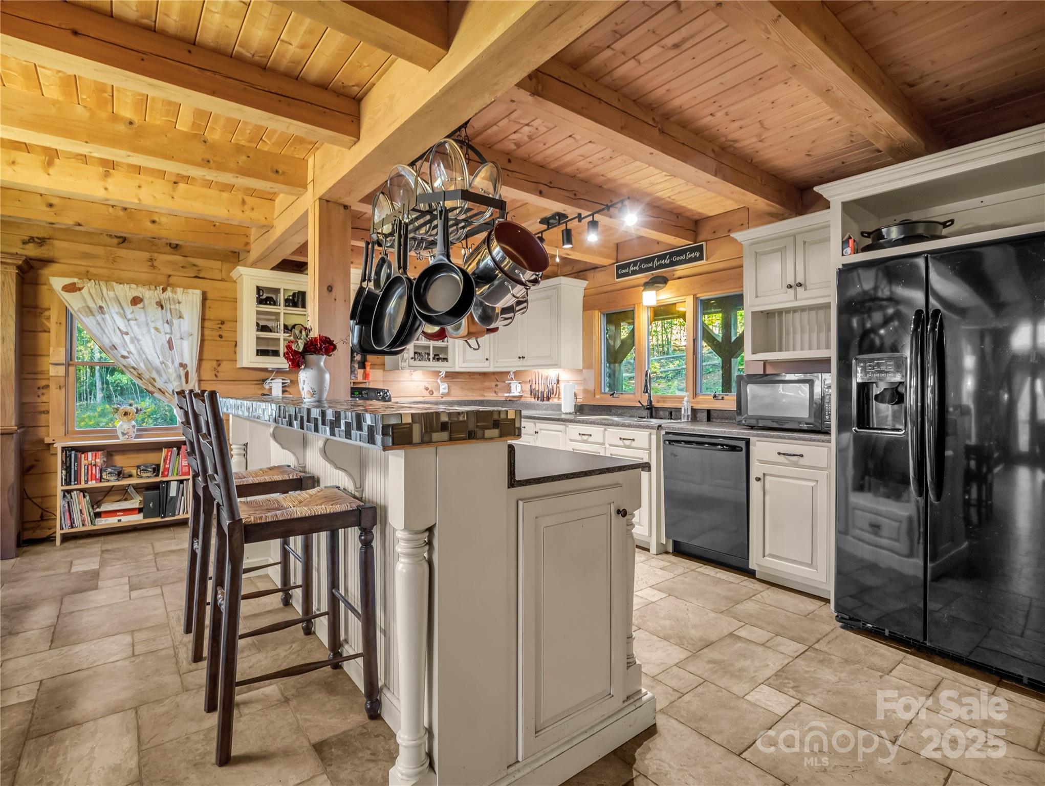 134 Moriah Drive Rutherfordton, NC 28139 - Photo 7 of 37 a kitchen with stainless steel appliances granite countertop a sink and a refrigerator