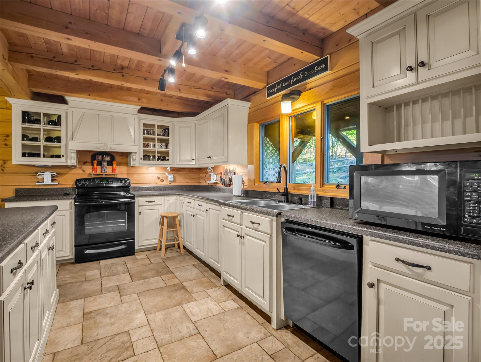 134 Moriah Drive Rutherfordton, NC 28139 - Photo 8 of 37 a kitchen with stainless steel appliances granite countertop a stove sink and cabinets