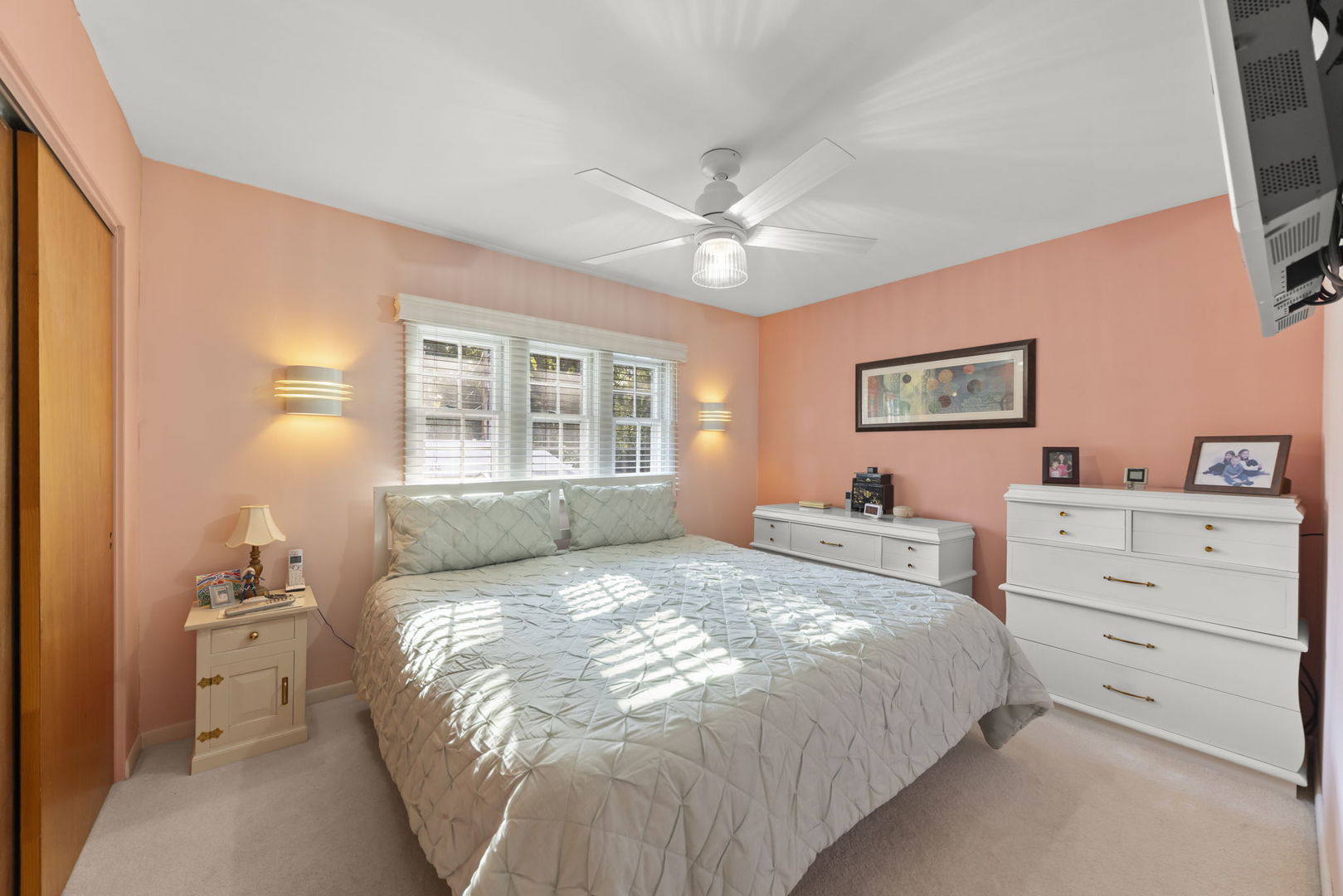 612 Wellner Road Naperville, IL 60540 - Photo 13 of 27 a bedroom with a bed and a window